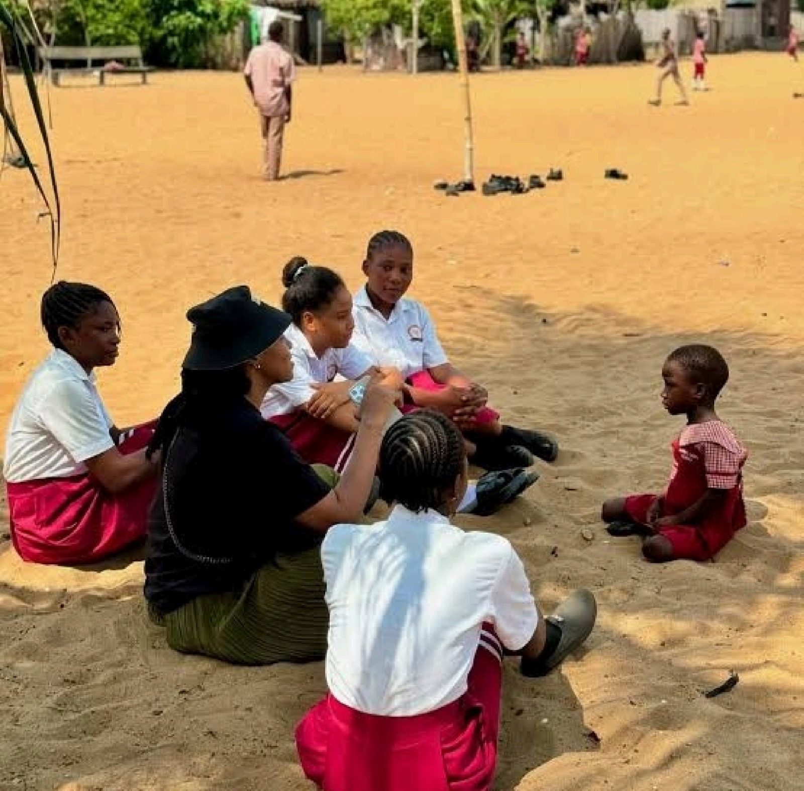 Shining Light Students on Beach Sand